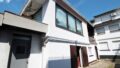 Eingang zu Haus und Gewerbeeinheit