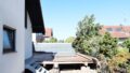 Rückseite mit Terrasse